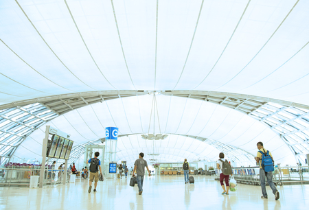 People moving to the gate at Bangkok International airport のeditorial素材