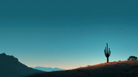 A striking silhouette of a solitary cactus against a vibrant sky at dusk, showcasing the serene beauty of the desert landscape and its unique flora.の素材