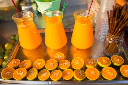 Orange juice in pitcherの写真素材
