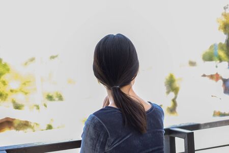 woman looking for somethingの写真素材