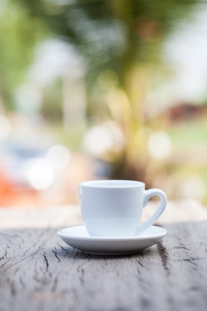 Coffee cup on wooden backgroundの写真素材