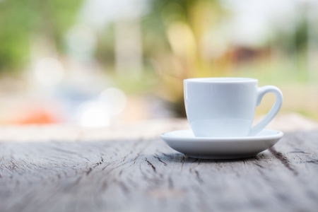 Coffee cup on wooden backgroundの写真素材