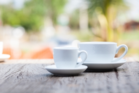 Coffee cup on wooden backgroundの写真素材
