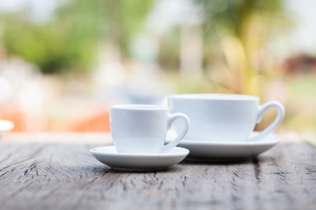 Coffee cup on wooden backgroundの写真素材