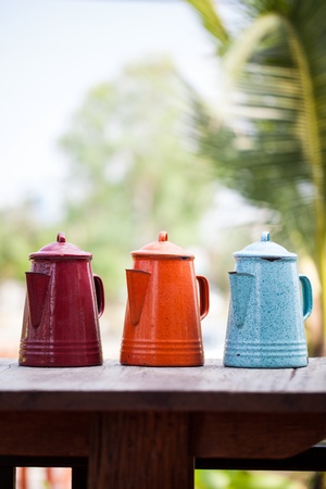 Colorful kettle on the tableの写真素材