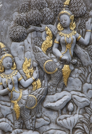 Thai art on the wall in the public temple of Thailandのeditorial素材