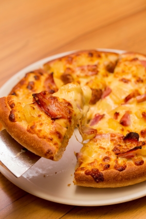 Pizza with Ham pineapple and thousand islandの写真素材