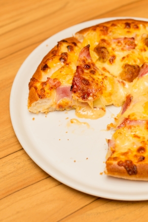 Pizza with Ham pineapple and thousand islandの写真素材