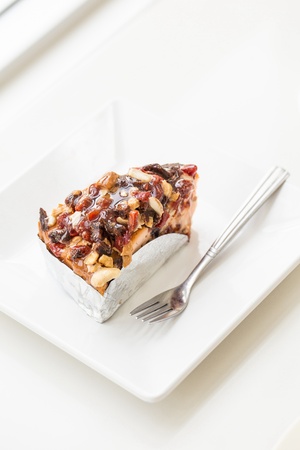 Piece of delicious fruit and nut cakeの写真素材