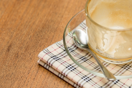 Coffee cup on a wooden tableの写真素材