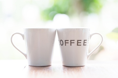 cup of coffee on wooden tableの写真素材