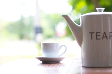 coffee and teapot on Wooden Tableの写真素材