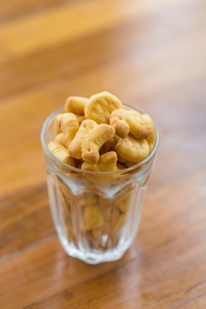 alphabet abc snack on wooden tableの写真素材