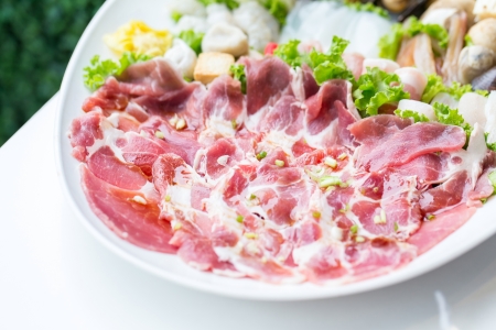 freshness raw pork on white dish for grillの写真素材