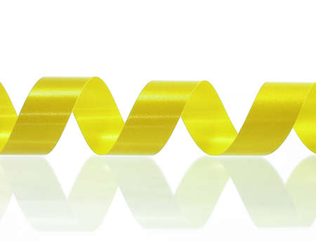 gold curled ribbonの写真素材