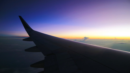 beautiful morning sky view from commercial airplane windowsの写真素材