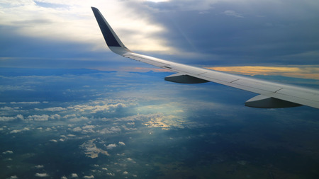 beautiful morning blue sky view from commercial airplane windowsの写真素材