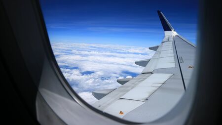 beautiful blue sky view from commercial airplane windowsの写真素材