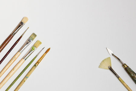 Canvas, brushes and palette knifeの写真素材