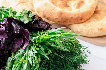 Pita bread with fresh dill, basil, coriander and tarragon