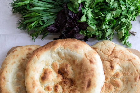 Pita bread with fresh dill, basil, coriander and tarragon