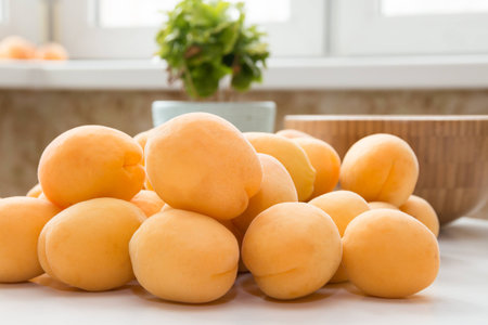 Apricot. Group of fresh fruits on a white tableの写真素材