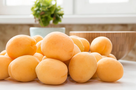 Apricot. Group of fresh fruits on a white tableの写真素材