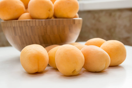 Apricot. Group of fresh fruits on a white tableの写真素材