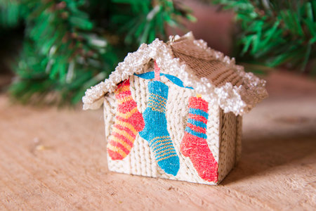 Fir tree decoration: handmade Christmas and New Year houses with ornamentsの写真素材
