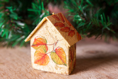 Fir tree decoration: handmade Christmas and New Year houses with ornamentsの写真素材