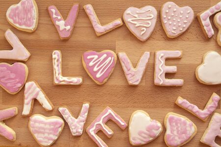 Cookies with frosting in the shape of a word love. Valentine's Dayの写真素材