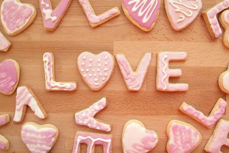 Cookies with frosting in the shape of a word love. Valentine's Dayの写真素材