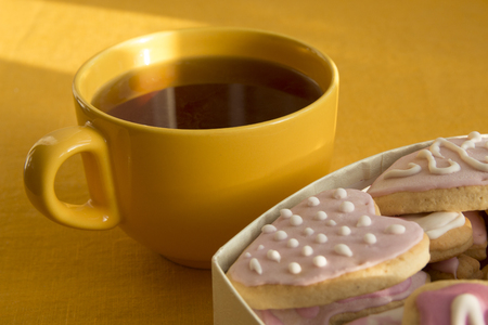 Cup of tea and cookies with frosting in the shape of a heart. Valentine's Dayの写真素材