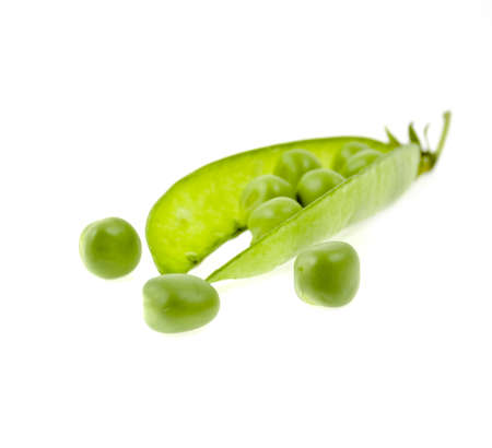 a pea green is in a pod on a white backgroundの写真素材