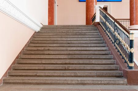 staircase up in the old style of the building of the stationの写真素材