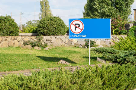 road sign no Parking in green parkland