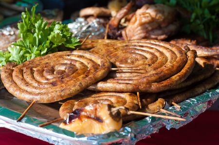 homemade sausages grilled on a tray before servingの写真素材