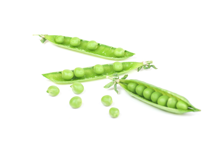 green peas isolated on white backgroundの写真素材