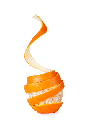 wraps around the peel of orange peeled fruit, the peel of a spiral, isolated on white backgroundの写真素材