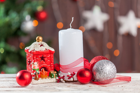 Christmas decoration with candle and fir branchesの写真素材