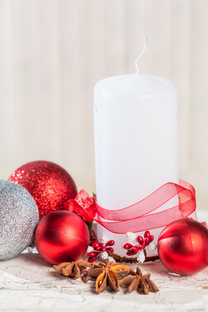 Christmas decoration with candle and fir branchesの写真素材