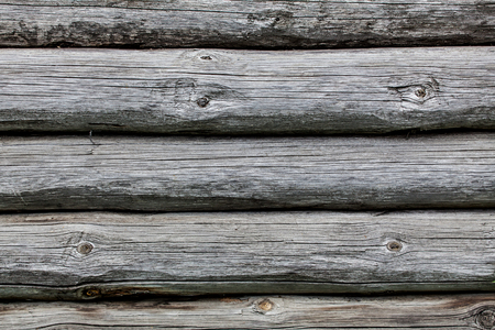 Wooden texture of round logs gray grunge texture. Folk, ethnic, Russian styleの写真素材