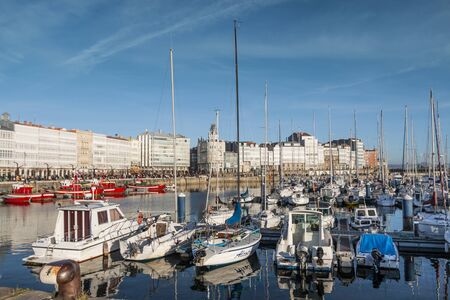 A CORUNA, SPAIN. DEC 2012: Darsena de la Marina sports ships waterfront view on a sunny winter dayのeditorial素材
