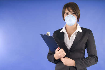 executive woman with protective mask for swaine flu or othersの写真素材