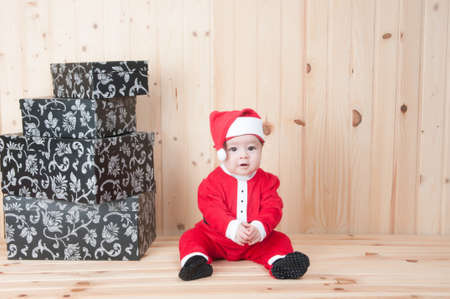 Child dressed as Santa Klaus