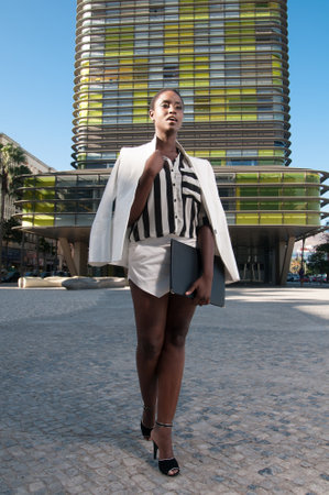 executive black woman in the business area of ââa cityの写真素材