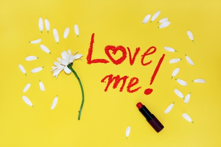 The phrase love me , written by lipstick.の写真素材