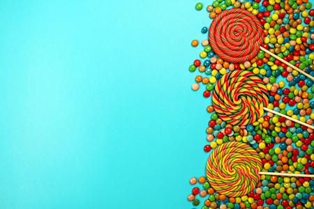 Lollipops on blue backgroundの写真素材