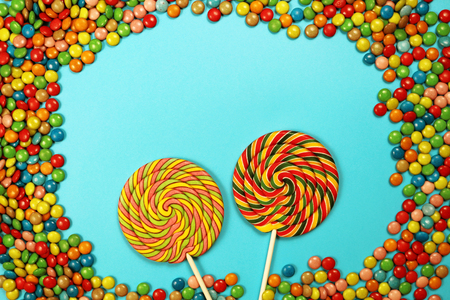 Lollipops on blue backgroundの写真素材