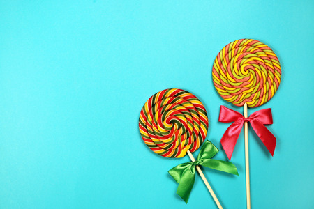 lollipops on blue backgroundの写真素材